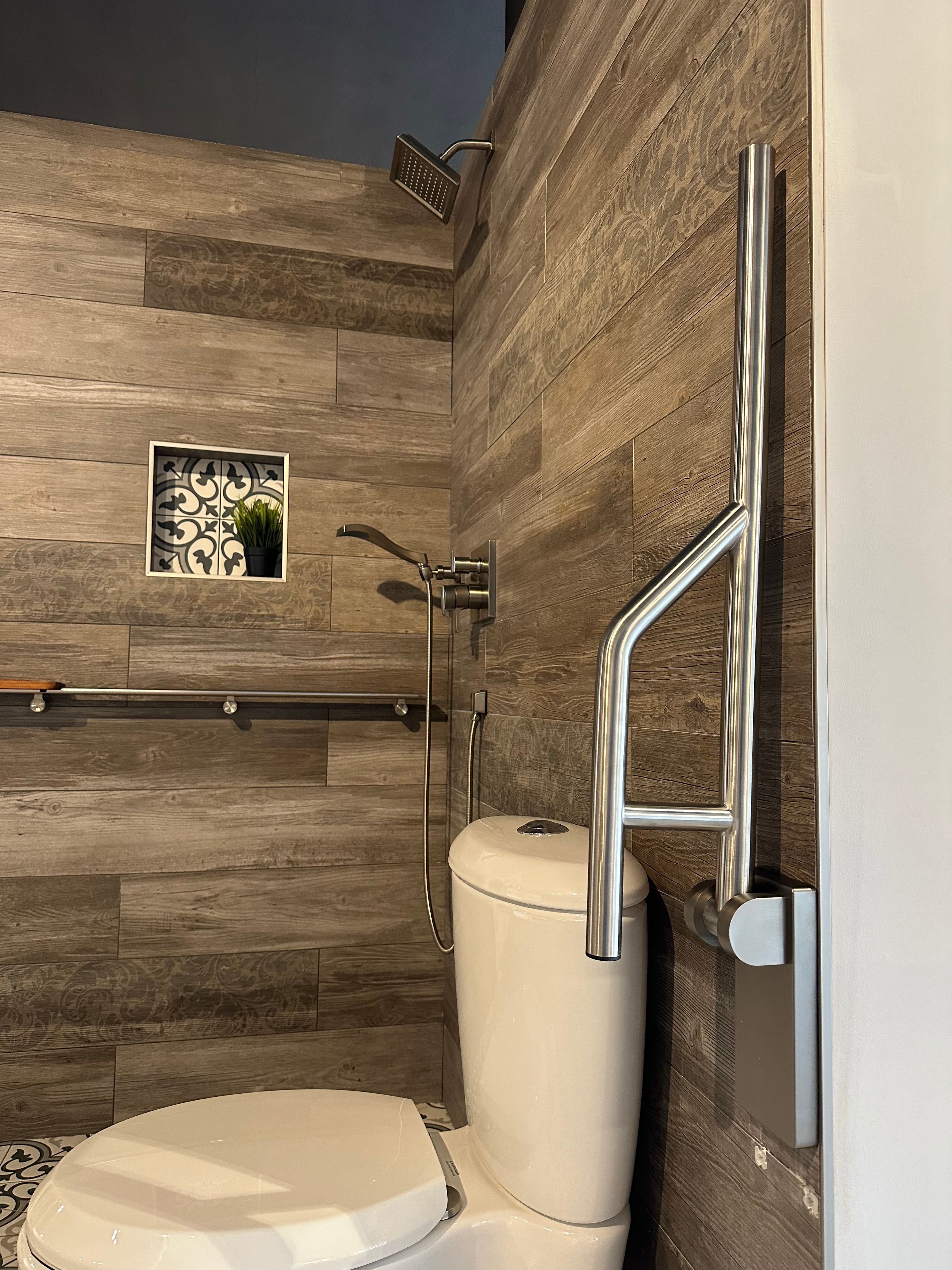 Grabcessories by LiveWell 31.5" stainless steel swing-up grab bars with a foldable design for accessibility and space-saving convenience. Available in multiple finishes.