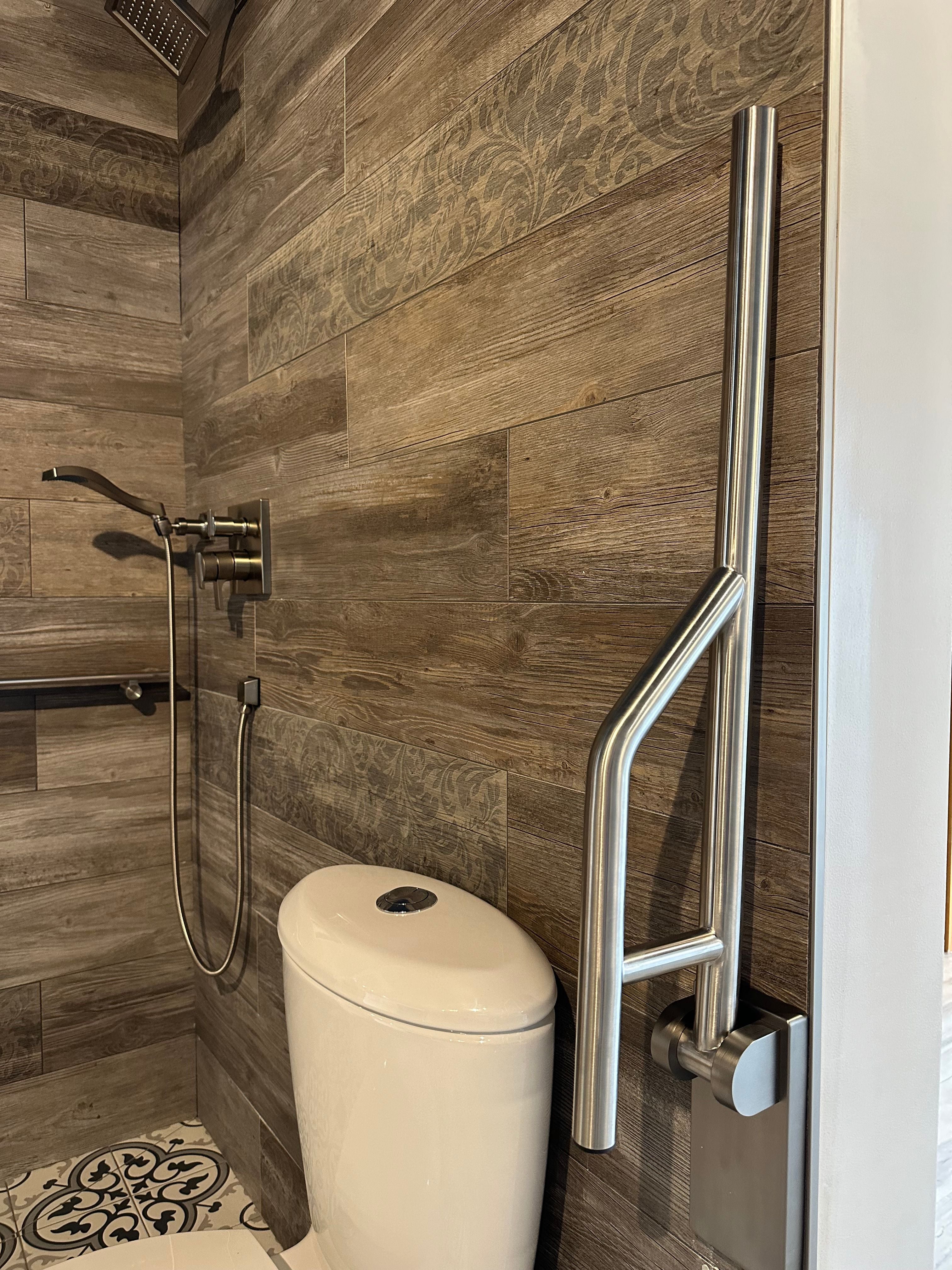 Grabcessories by LiveWell 31.5" stainless steel swing-up grab bars with a foldable design for accessibility and space-saving convenience. Available in multiple finishes.