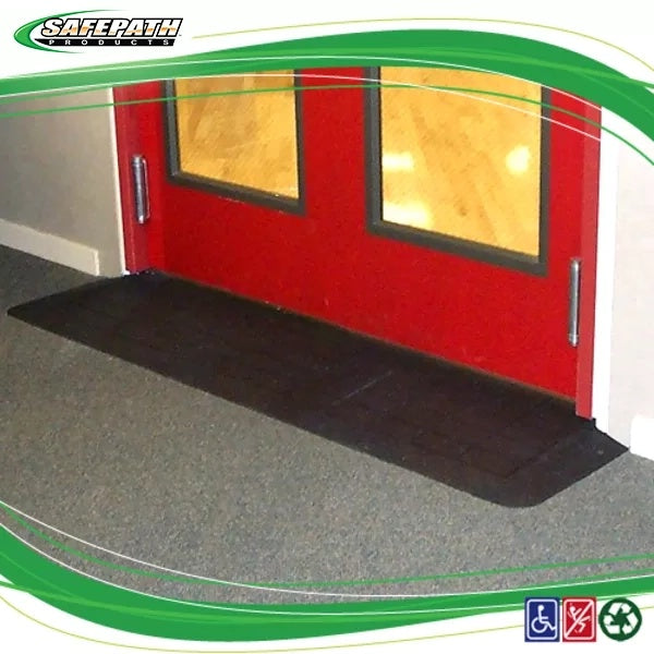 Black mat in front of a red door with 'SafePath Products' branding. EZEdge™ Wheelchair Ramps