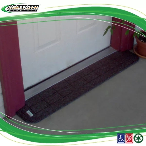 Anti-fatigue mat in front of a white door with 'Safer Path' branding. EZEdge™ Wheelchair Ramps