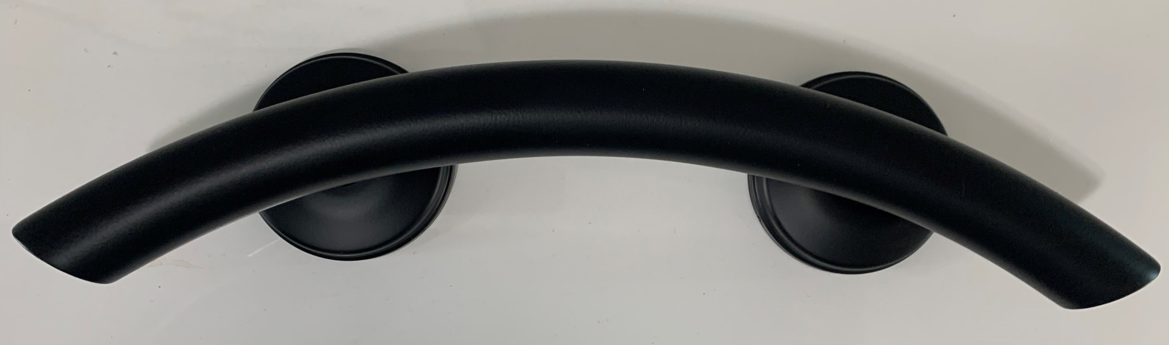 15-inch arched Anywhere Grab Bars with angled ends, EZ Clean rubber nubby grips, and a versatile design for installation over shower valves, vanities, and more.