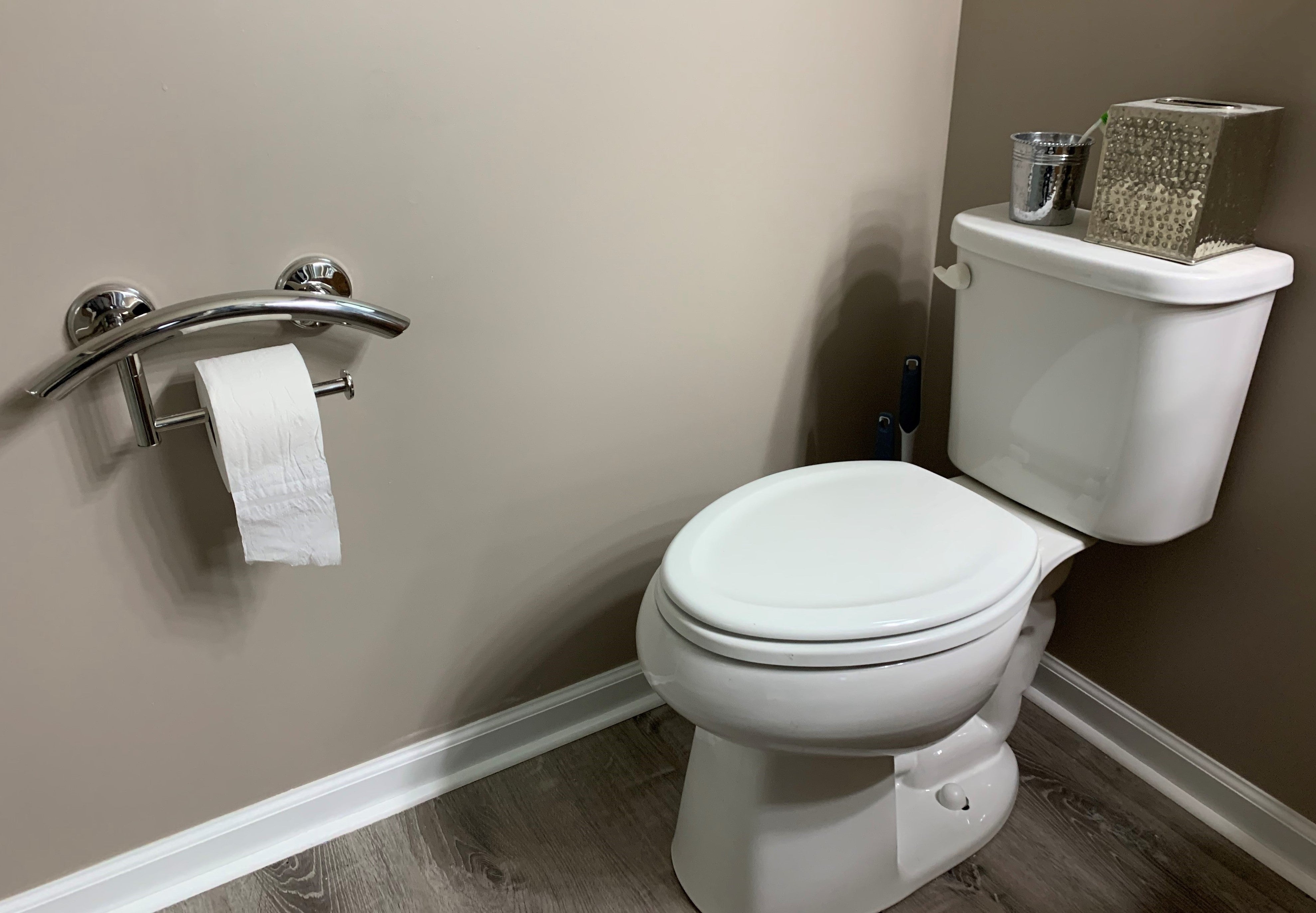 3-in-1 arched grab bars designed as a toilet paper holder or hand towel bar with EZ Clean rubber nubby grips for safety and stability.
