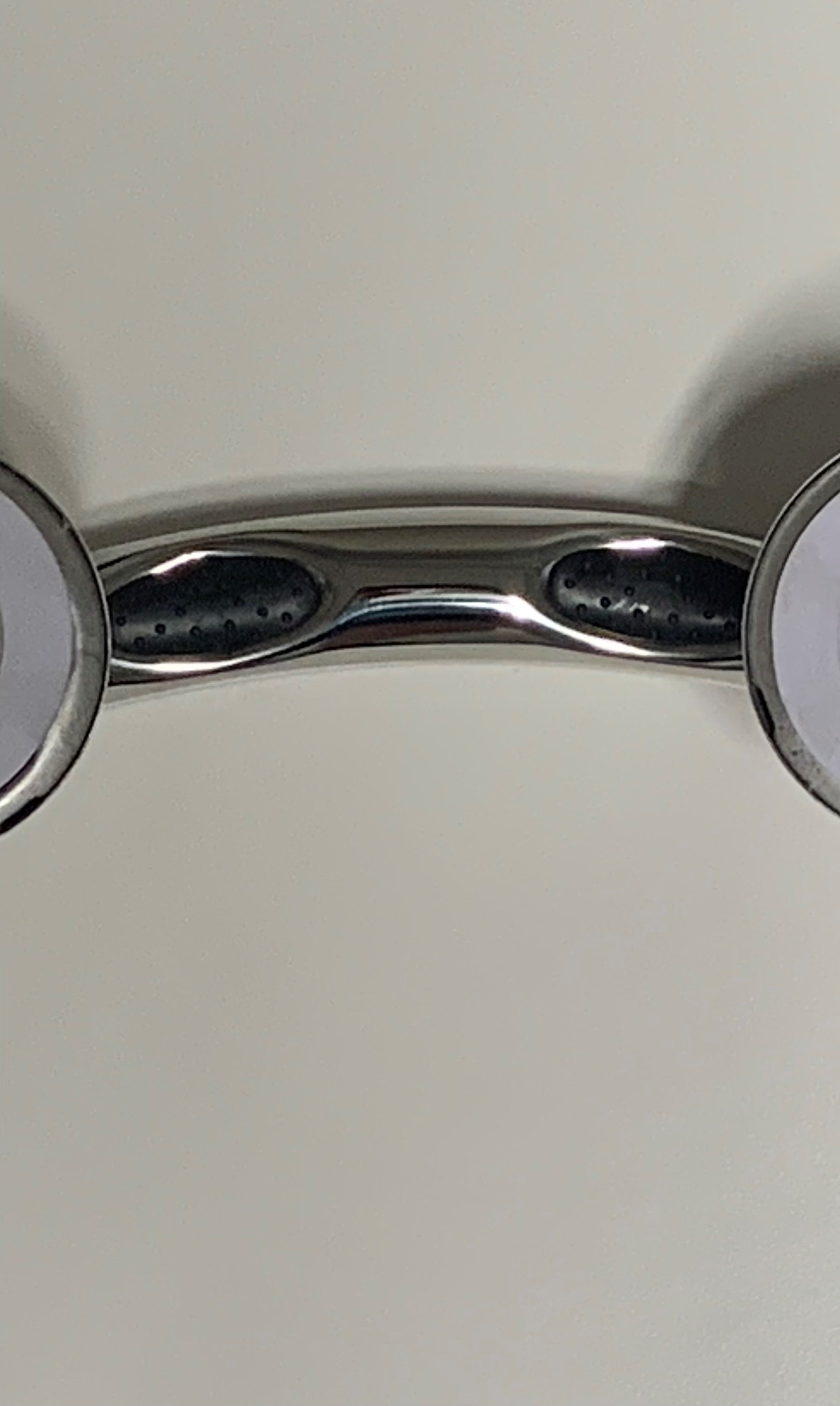 15-inch arched Anywhere Grab Bars with angled ends, EZ Clean rubber nubby grips, and a versatile design for installation over shower valves, vanities, and more.